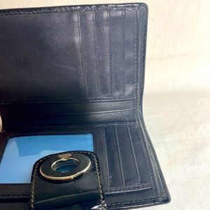 Coach black Patton like marital.